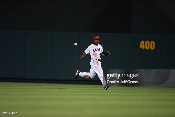 Chone Figgins of the Los Angeles Angels of Anaheim runs to intercept the ball against the Texas Rangers at Angel Stadium on September 25, 2006 in...