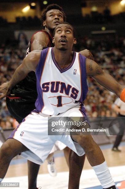 Amare Stoudamire of the Phoenix Suns against Samuel Dalembert of the Philadelphia 76ers during a preseason game as part of the NBA Europe Live Tour...