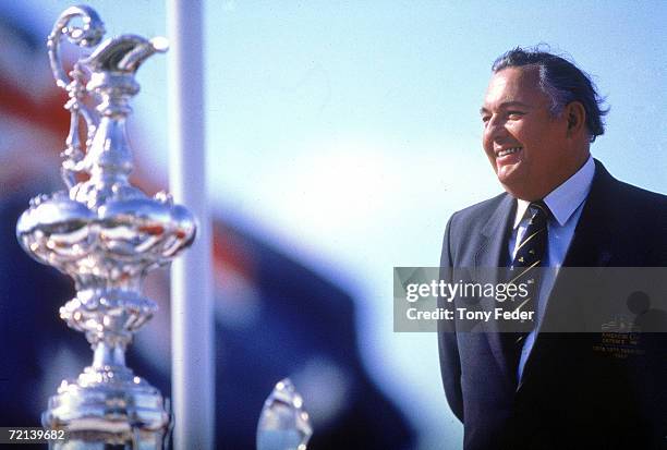 Alan Bond stands during the presentation after the America's Cup in Fremantle, 1987 in Perth, Australia. Stars and Stripes of the USA beat Australia...