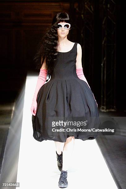 Model walks down the catwalk during the Yohji Yamamoto Fashion Show as part of Paris Fashion Week Spring/Summer 2007 on October 2, 2006 in Paris,...