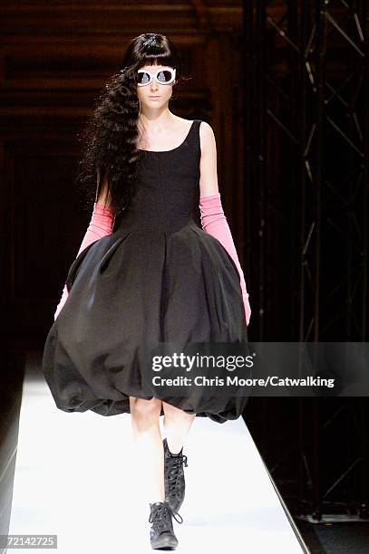 Model walks down the catwalk during the Yohji Yamamoto Fashion Show as part of Paris Fashion Week Spring/Summer 2007 on October 2, 2006 in Paris,...