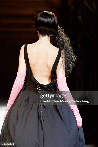 Model walks down the catwalk during the Yohji Yamamoto Fashion Show as part of Paris Fashion Week Spring/Summer 2007 on October 2, 2006 in Paris,...