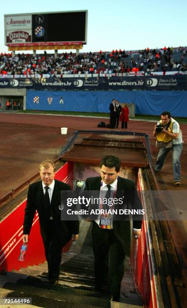 England's Manager Steve McLaren and Communications Officer Adrian Bevington enter the stadium from the underground tunnel ahead of their Group E...