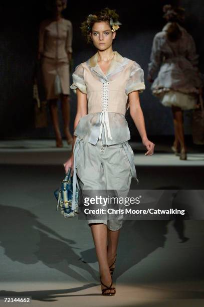Model walks down the catwalk during the Louis Vuitton Fashion Show as part of Paris Fashion Week Spring/Summer 2007 on October 8, 2006 in Paris,...