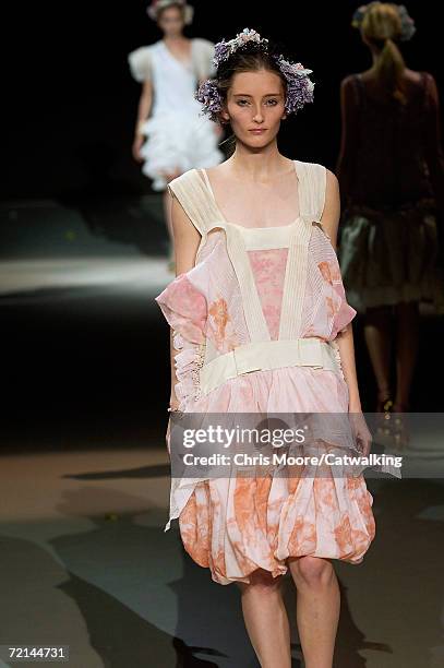 Model walks down the catwalk during the Louis Vuitton Fashion Show as part of Paris Fashion Week Spring/Summer 2007 on October 8, 2006 in Paris,...