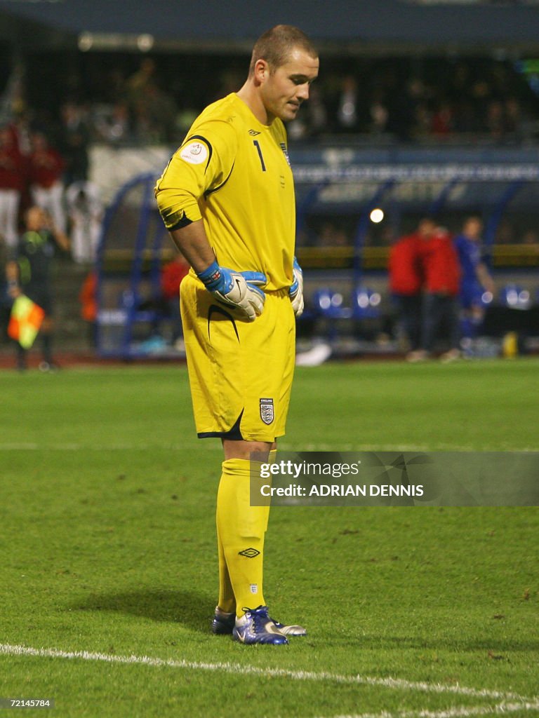 England's goalkeeper Paul Robinson looks