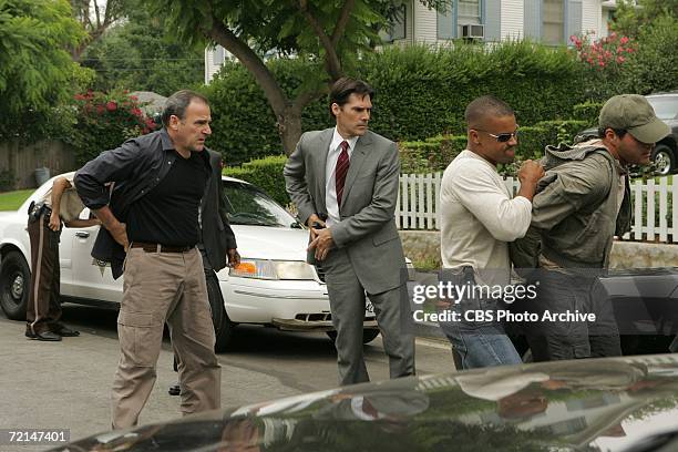 From Left: Mandy Patinkin as Jasnon Gideon, Thomas Gibson as Special Agent Aaron Hotchner, and Shemar Moore as Special Agent Derek Morgan on CRIMINAL...