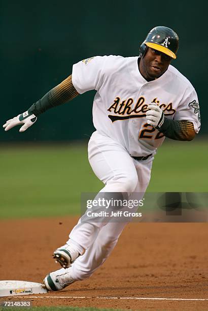 Milton Bradley of the Oakland Athletics runs the bases after hitting a two run home run against the Detroit Tigers during the third inning of Game...