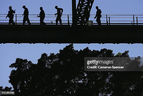 Bridge climb leader leads people on the Sydney Harbour Bridge October 12, 2006 in Sydney, Australia. The Australian Bureau of Statistics announced...