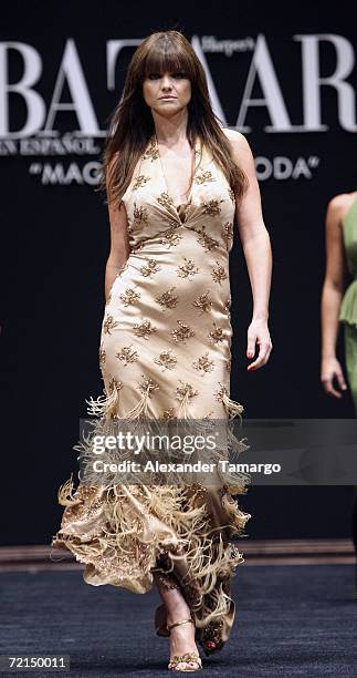 Actress Araceli Gonzalez walks the runway during the Harper's Bazaar en Espanol Collection at the Carnival Center for the Performing Arts during...