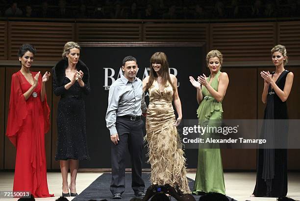 Designer Gustavo Cadile and actress Araceli Gonzalez walk the runway during the Harper's Bazaar en Espanol Collection at the Carnival Center for the...