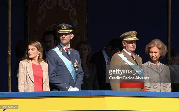 Princess Letizia, Crown Prince Felipe, King Juan Carlos and Queen Sofia of Spain attend Spain's National Day Military Parade in Castellana Avenue on...