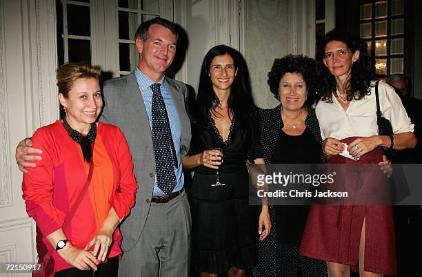 Maria Teresa Fendi Director Zana Briski and Carla Fendi pose with guests at the after party for Born into Brothels at Palazzo Fendi on October 11,...