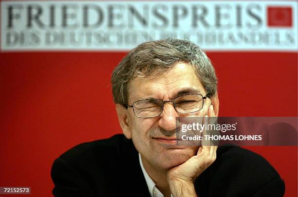 Frankfurt am Main, GERMANY: FILES - Picture taken 22 October 2005 shows Turkish novellist Orhan Pamuk giving a press conference during Frankfurt's...