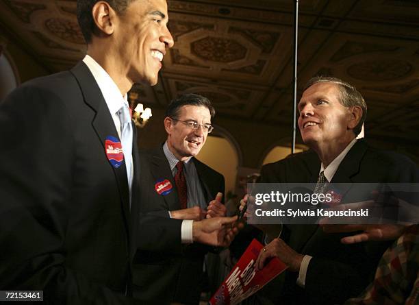 Senator Barack Obama shakes hands with supporters at a rally for U.S. Senator Robert Menendez on October 12, 2006 at the Masonic Temple in Trenton,...