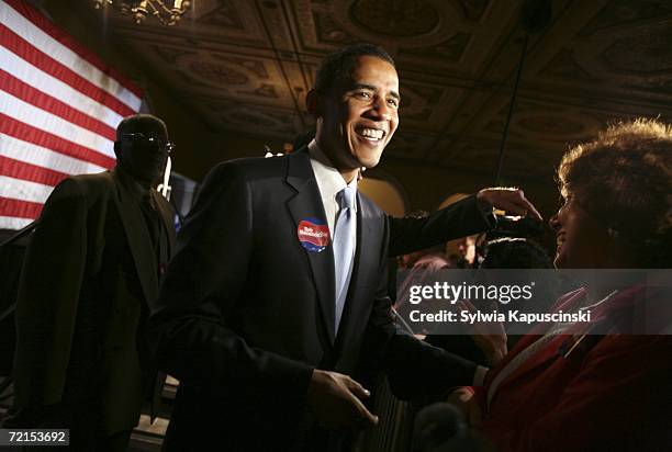 Senator Barack Obama shakes hands with supporters after a rally for U.S. Senator Robert Menendez on October 12, 2006 at the Masonic Temple in...