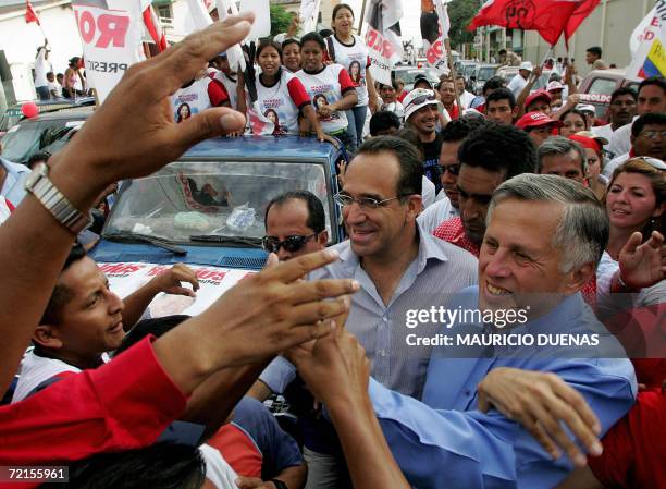 Presidential candidate Leon Roldos greets supporters during the closing day campaign 12 October in Guayaquil, Guayas Province, Ecuador. According to...