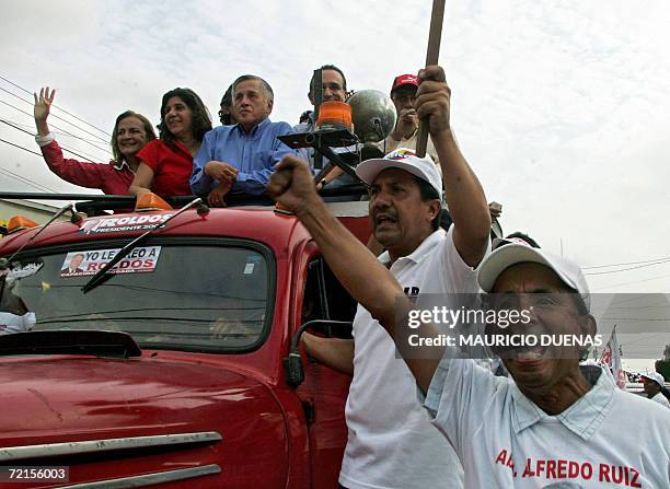 Supporters of presidential candidate Leon Roldos cheer on the campaigns' closing day 12 October in Guayaquil, Guayas Province, Ecuador. According to...