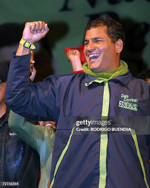 Presidential candidate Rafael Correa, of the Country Alliance party, cheers at supporters during the final rally of his campaign on October 12th in...