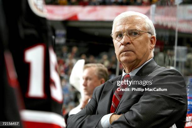 Bryan Murray of the Ottawa Senators watches from the bench as his team was about to be shutout in a game against the Calgary Flames on October 12,...