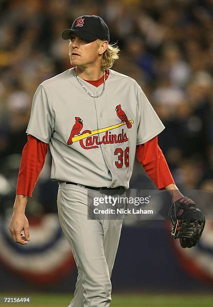 Jeff Weaver of the St. Louis Cardinals walks off the mound against the New York Mets in the bottom of the sixth inning of game one of the NLCS at...