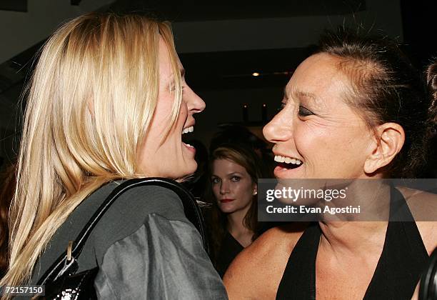 Actress Uma Thurman and designer Donna Karan attend the Donna Karan "Gold" fragrance collection launch at the Donna Karan Flagship store, October 12,...