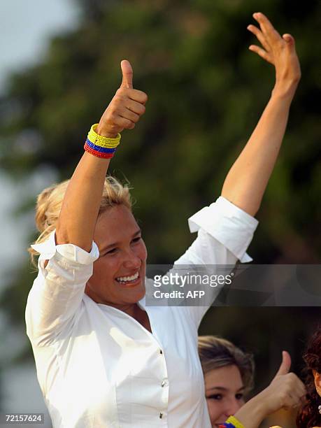 Presidential candidate Cinthya Viteri waves to supporters during the closing day campaign for the next Sunday elections 12 October in Guayaquil,...