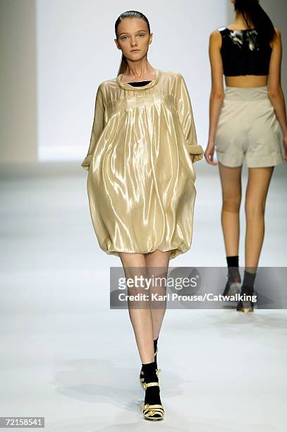 Model walks down the catwalk during the Cacharel Fashion Show as part of Paris Fashion Week Spring/Summer 2007 on October 5, 2006 in Paris, France.