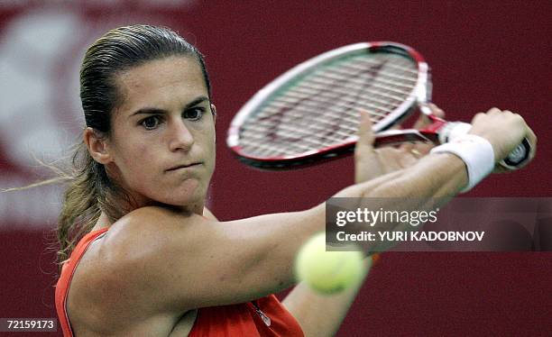 Moscow, RUSSIAN FEDERATION: French tennis player Amelie Mauresmo hits a backhand to Czech Nocole Vaidisova during their Kremlin Cup tennis tournament...