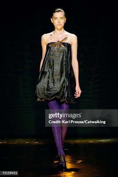 Model walks down the catwalk during the Chapurin Fashion Show as part of Paris Fashion Week Spring/Summer 2007 on October 7, 2006 in Paris, France.