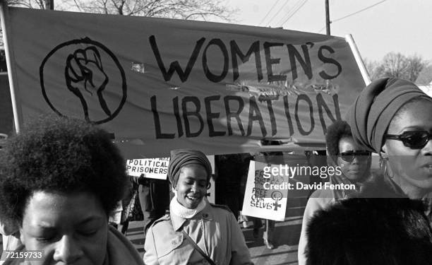 Group of women, under a 'Women's Liberation' banner, march in support of the Black Panther Party, New Haven, Connecticut, November 1969.