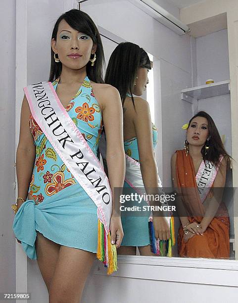 Participants in the Miss Tibet Pageant 2006, pose as they prepare for the swimsuit round of the competition in Dharamsala, 13 October 2006. The...