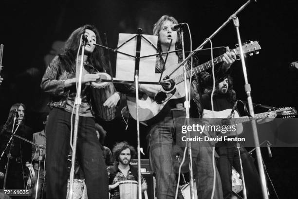 Married singer musicians Yoko Ono and John Lennon perform at the 'Free John Now' rally at Crisler Arena , Ann Arbor, Michigan, December 10, 1971....