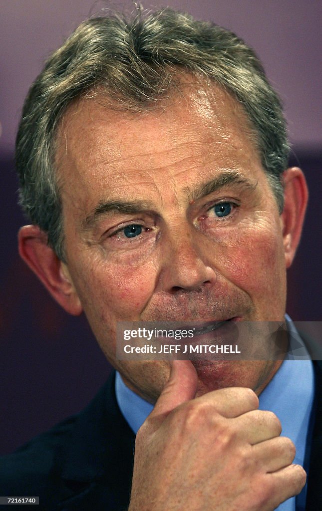 British Prime Minister Tony Blair speaks during a press conference 13