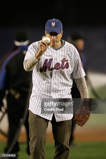 The Daily Show host Jon Stewart throws out the first pitch before game two of the NLCS between the New York Mets and the St. Louis Cardinals at Shea...