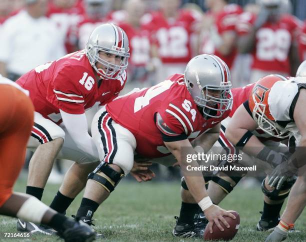 Quarterback Rob Schoenhoft of the Ohio State Buckeyes stands under center Tyler Whaley during the game against the Bowling Green Falcons at Ohio...