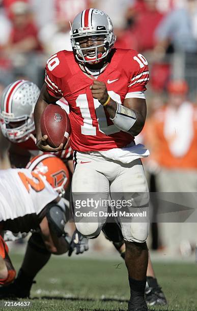 Quarterback Troy Smith of the Ohio State Buckeyes runs with the ball during the game against the Bowling Green Falcons at Ohio Stadium on October 7,...