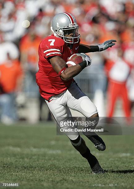 Wide receiver Ted Ginn Jr. #7 of the Ohio State Buckeyes runs with the ball during the game against the Bowling Green Falcons at Ohio Stadium on...