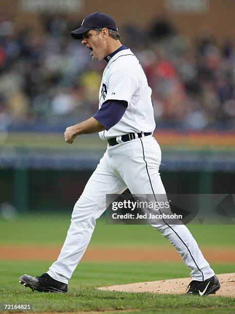 Starting pitcher Kenny Rogers of the Detroit Tigers celebrates after D'Angelo Jimenez the Oakland Athletics hit into a double play during the fifth...