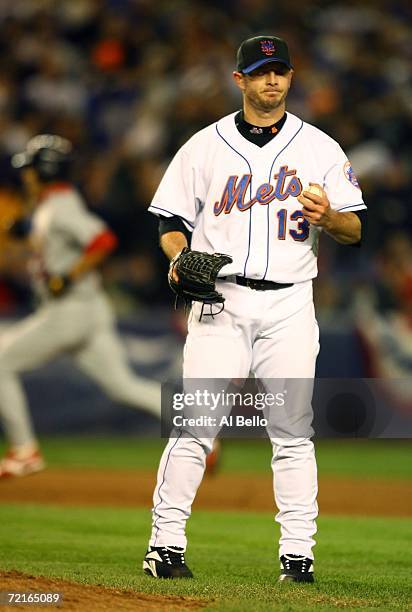 So Taguchi of the St. Louis Cardinals rounds the bases after hitting a solo home run in the ninth off of Billy Wagner of the New York Mets during...