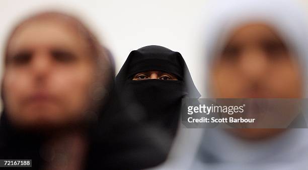Muslim woman wearing a niqab veil listens during a seminar organised by the women?s chapter of Hizb-ut-Tahrir Britain, to challenge the remarks made...