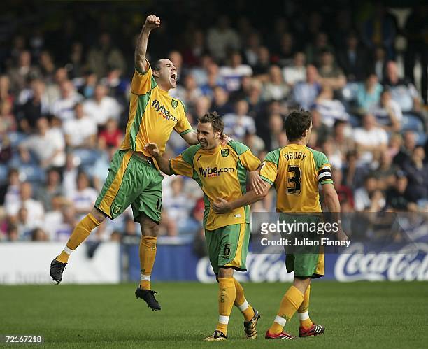 Andy Hughes and Darren Huckerby of Norwich celebrate Huckerbys goal during the Coca-Cola Championship match between Queens Park Rangers and Norwich...