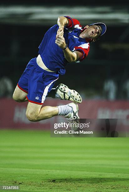 Rikki Clarke of England dives for a catch during a practice session ahead of the match between India and England in the ICC Champions Trophy, at the...