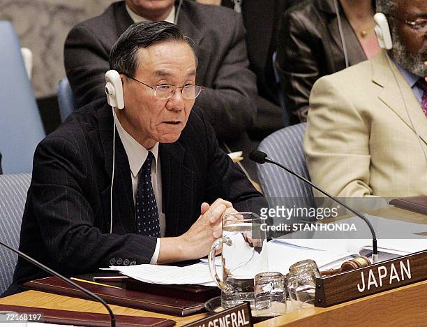 Kenzo Oshima, Japan's Ambassador to the United Nations and President of the Security Council, speaks, 14 October 2006, after the Council voted...