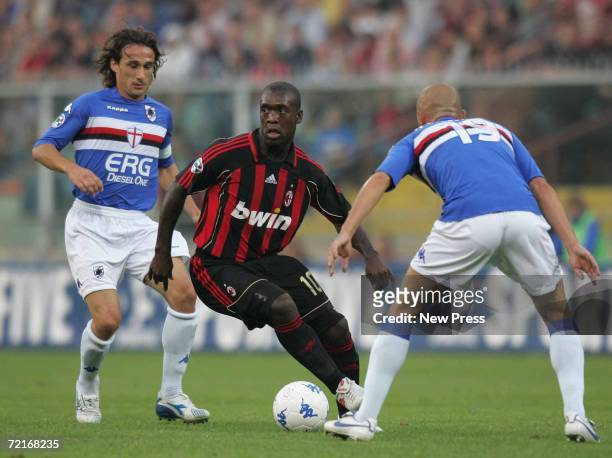 Sergio Volpi and Giulio Falcone of Sampdoria competes with Clarence Seedorf of Milan during the Serie A match between Sampdoria and AC Milan at Luigi...