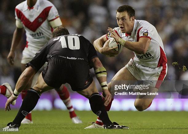James Roby of St. Helens is challenged by Garreth Carvell of Hull FC during the Engage Super League Grand Final between St. Helens and Hull FC at Old...