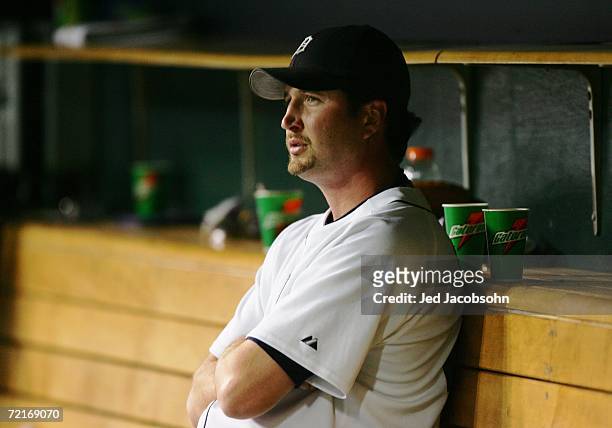 Relief pitcher Jason Grilli of the Detroit Tigers reacts in the dugout after loading the bases in the eighth inning of Game Four of the American...