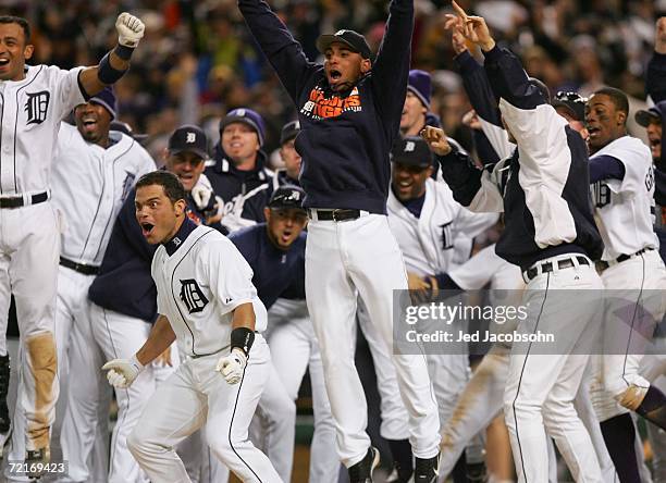 Members of the Detroit Tigers celebrate after defeating the Oakland Athletics in Game Four of the American League Championship Series on October 14,...