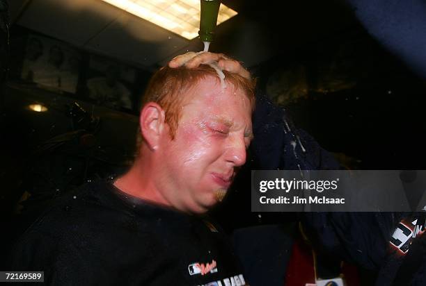 Chris Shelton of the Detroit Tigers celebrates in the locker room against the Oakland Athletics during Game Four of the American League Championship...