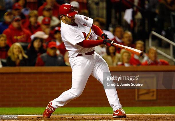 Jeff Suppan of the St. Louis Cardinals bats in the second inning against the New York Mets during game three of the NLCS at Busch Stadium on October...